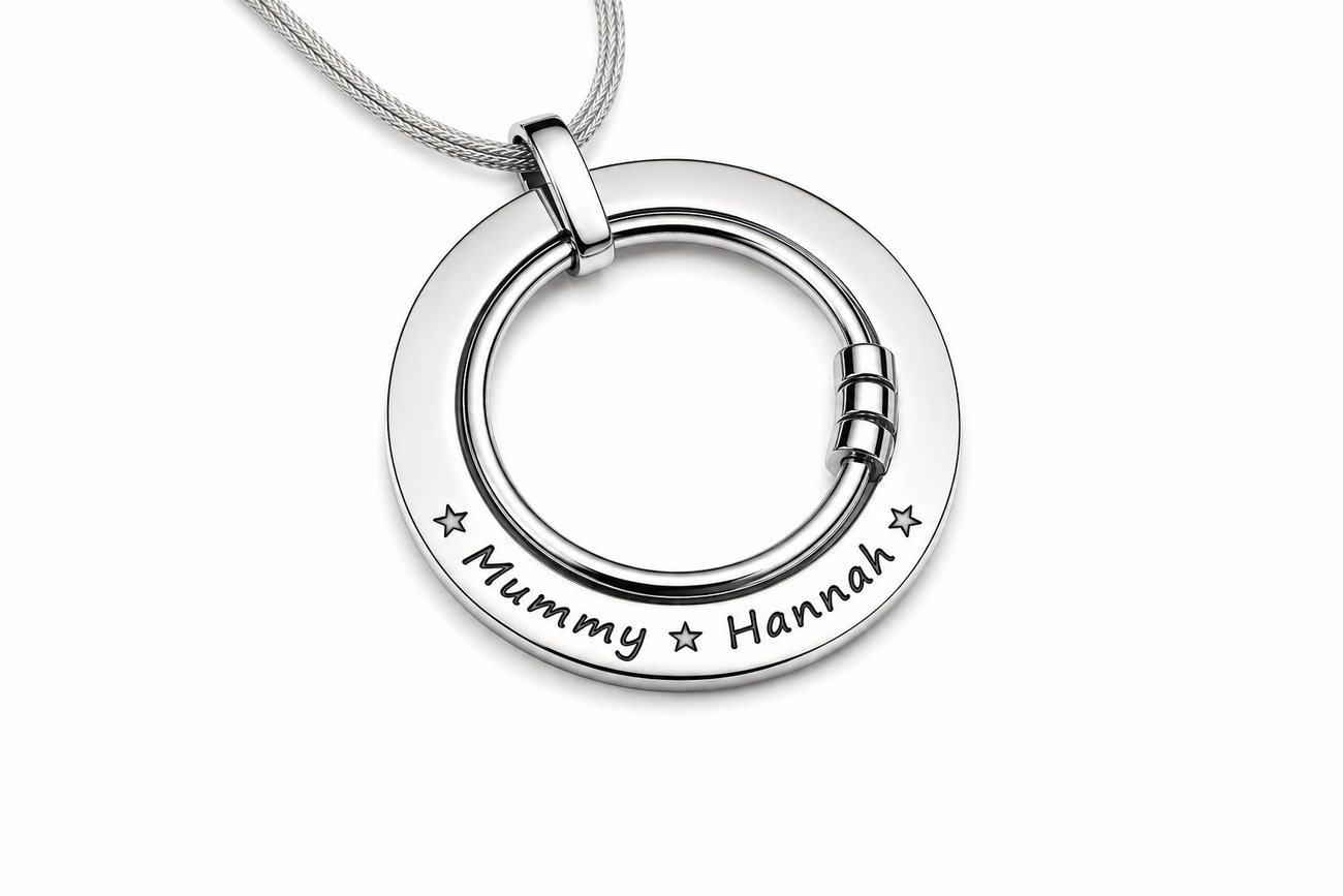 Engraved feeding necklace with two interlinked stainless steel rings on a cotton cord